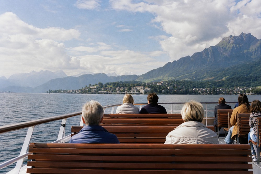 Steamer passing a cliff face on the southern arm of Lake Lucerne, no text, no logos, no people