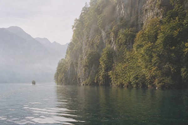 The steep-walled Lake Uri arm of Lake Lucerne with cliffs dropping straight into the water